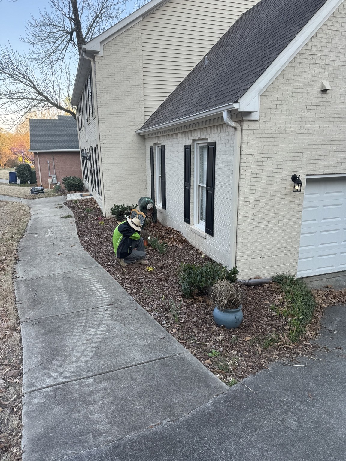 Highmark crew planting along the foundation bed